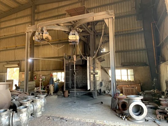 Ladle Pouring into Heavy Flask Molds